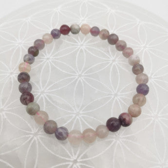 Tourmaline rose/ Rubellite, perles rondes de 6 ou 8 mm, vendu en : fil de perle 38/39 cm, en bracelet de 17 à 21cm, en collier de 45 ou sautoir de 60cm. Qualité AA à AAA, les plus belles selon Gem & Zen !