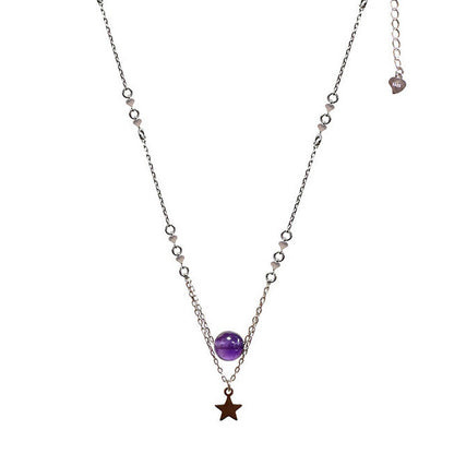 0.925 silver necklace, 40 cm long, accompanied by a delicate 5 cm chain. This jewel is adorned with an elegant 8 mm amethyst pearl as well as a star. Length: 40 cm Pearl diameter: 8 mm Packaging: The piece