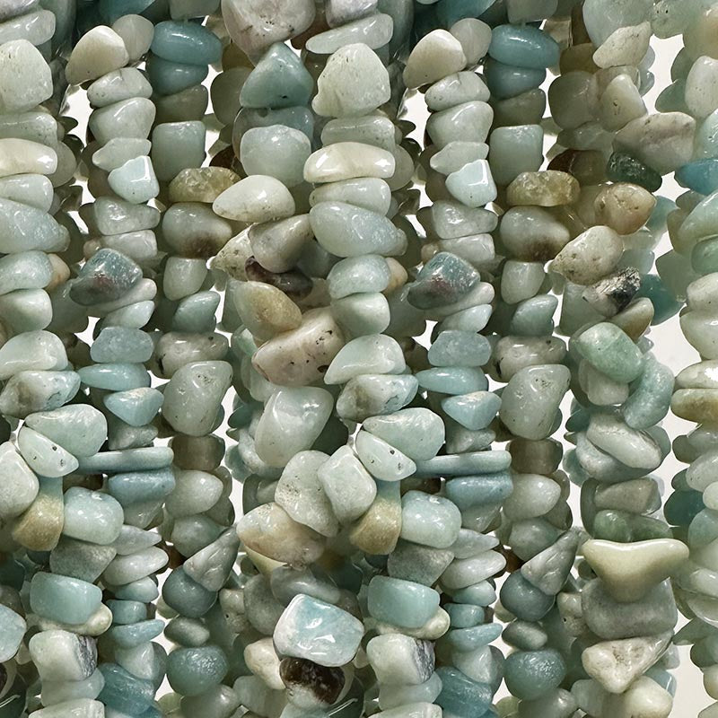 Amazonite, bracelet de 17 à 21cm, collier de 42cm et sautoir de 85cm. Perles de type 'baroque/ chips' de formes naturelles montées sur fil élastique ou fil d'acier de haute résistance !
