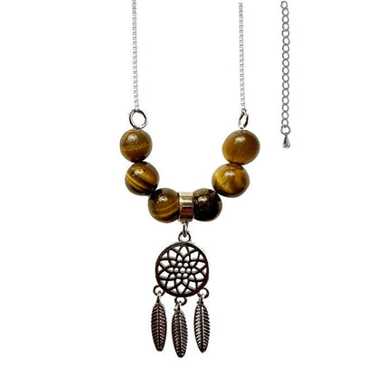 Chaîne avec chaînette de rallonge de 41,5 centimètres, en bronze galvanisé, ornée d'un pendentif attrape rêve et de 6 perles de 6 milimètres en pierres ! Disponible en Améthyste, labradorite, oeil de tigre !