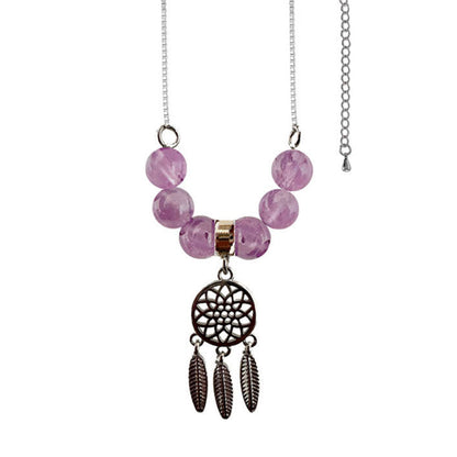 Chaîne avec chaînette de rallonge de 41,5 centimètres, en bronze galvanisé, ornée d'un pendentif attrape rêve et de 6 perles de 6 milimètres en pierres ! Disponible en Améthyste, labradorite, oeil de tigre !