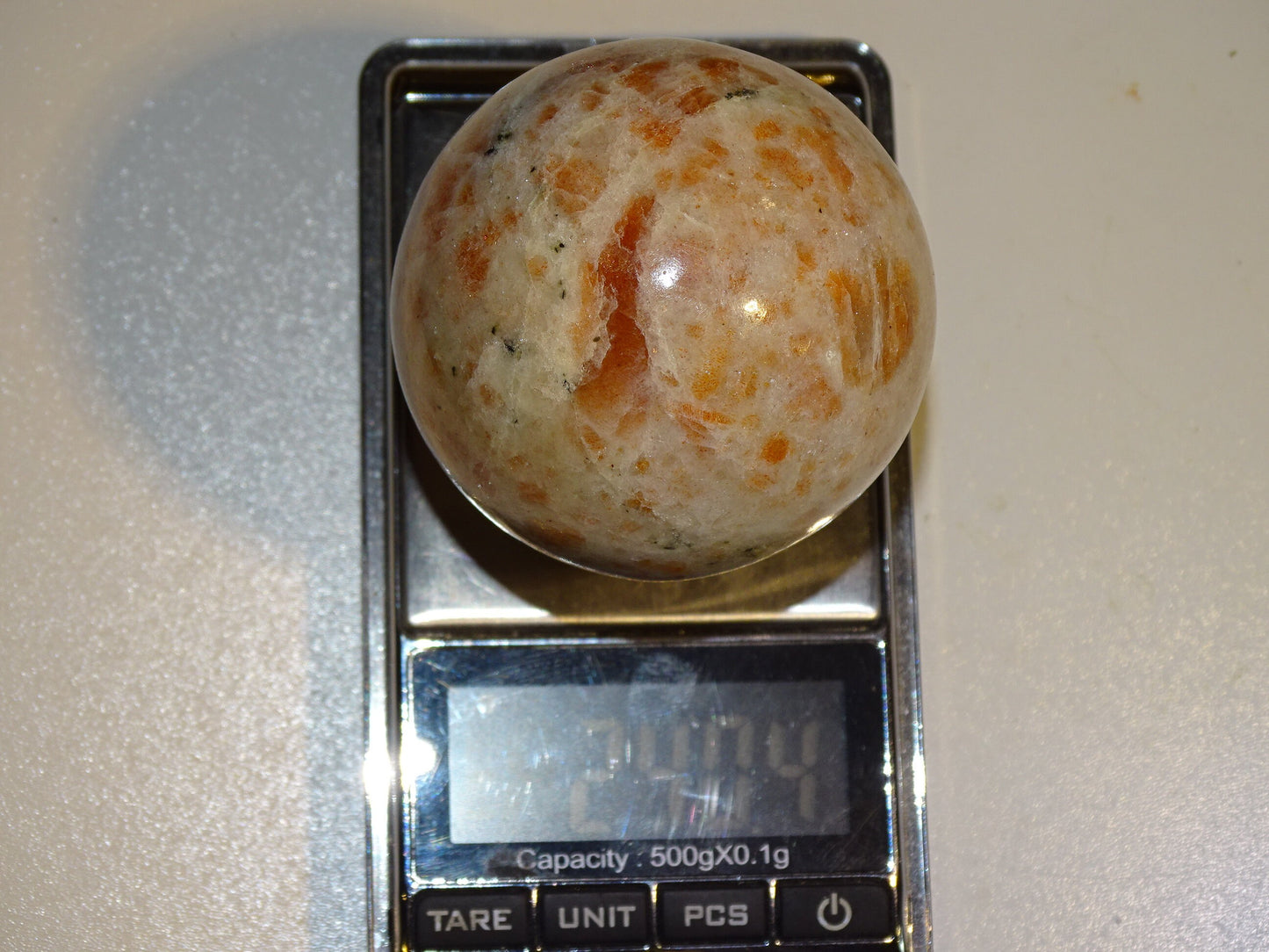 Sphère en Pierre du soleil, 2 pièces unique au choix de 43 et 56 millimètres - 113 et 240 grammes. une pierre naturellement belle ! Parfait pour la lithothérapie, collection, exposition...!