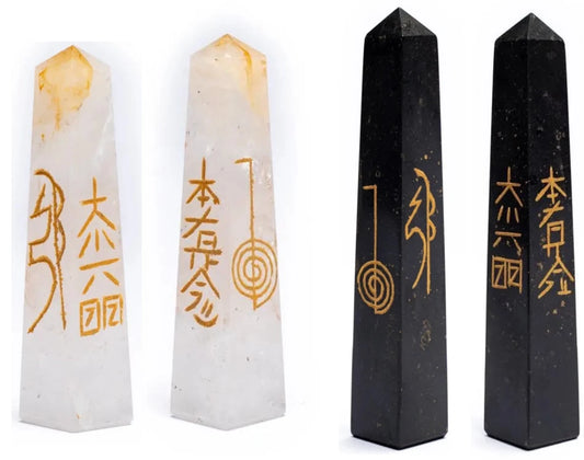 Rock crystal or black tourmaline obelisk with engraved 'Reiki' symbols. 8 to 10 cm tall / 90 g. Highly recommended by crystal healers, Reiki practitioners, and feng shui specialists.