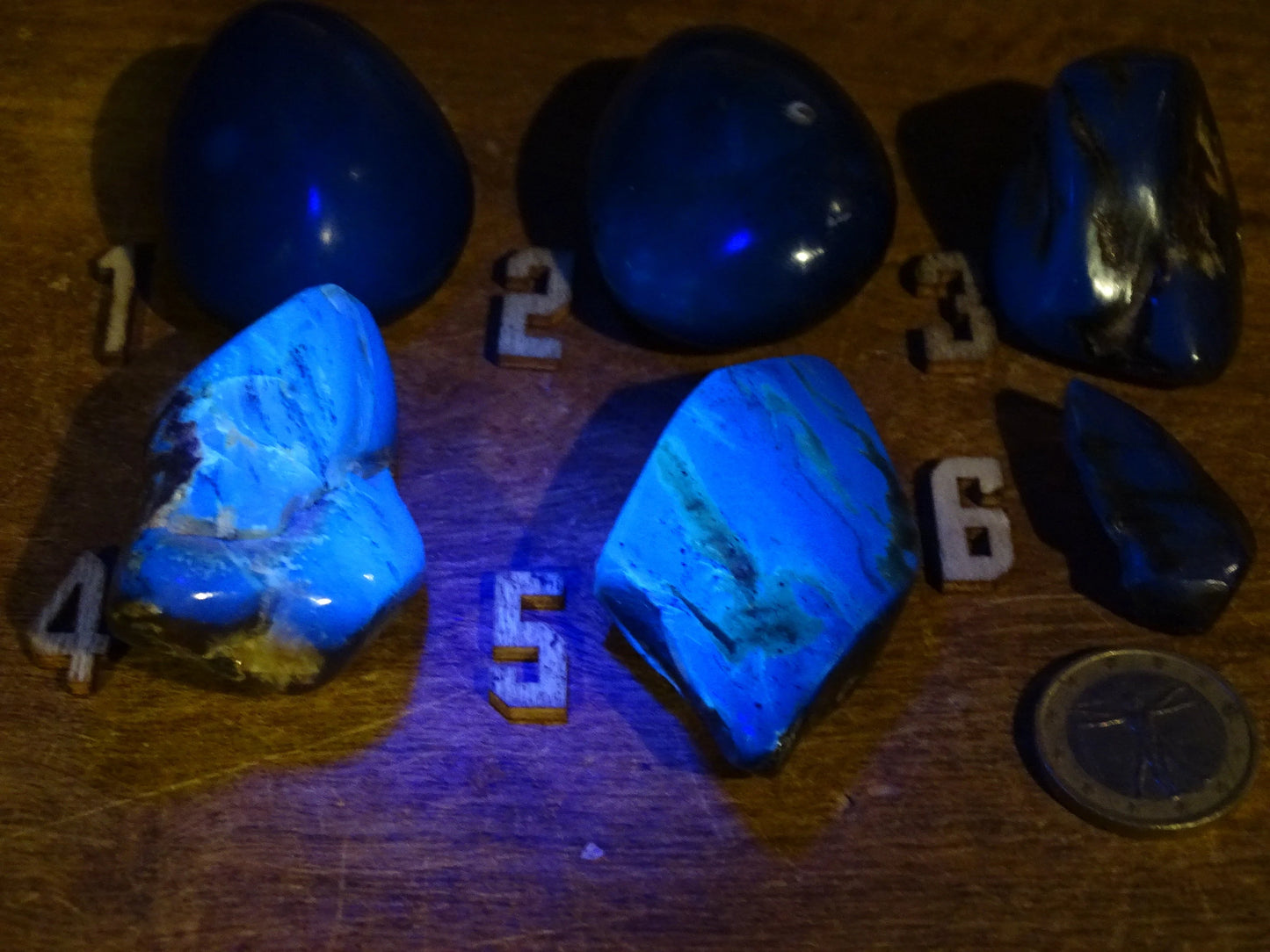Sumatran blue amber, a selection of polished pebbles, 'cherry/cognac amber' color. Very high quality, when transparent you will see incredible amber red reflections and a captivating blue under a UV lamp!