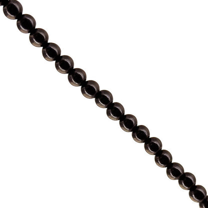 Bois d'ébène (bois), en fil de perle de 6mm, bracelet de 17 à 21cm, collier de 42cm et sautoir de 60cm. Perles rondes, finition naturelle, magnifique !