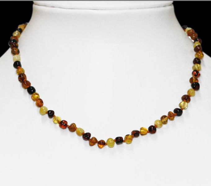 Amber with a 'brilliant' finish, 5/7 millimeter free-form beads, sold in a 44-centimeter necklace. 'Amber screw' clasp system. AA to AAA quality, superb beads, lightweight and incredibly soft!