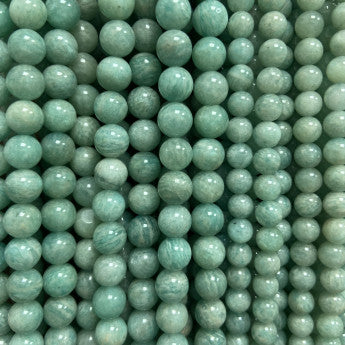 Amazonite from Mozambique, round beads of 4, 6 or 8 mm. Sold in 38/39 cm bead strand, in 17 to 21 cm bracelets, in 45 cm necklaces or 60 cm long necklaces. AA to AAA quality, superb beads, magnificent beadwork!
