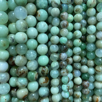 Chrysoprase, perles rondes de 6 et 8 mm, vendu en : fil de perle 38/39 cm, en bracelet de 17 à 21cm, en collier de 45 ou sautoir de 60cm. Qualité AA à AAA, superbes perles !