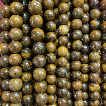 Opale Boulder d'Australie, perles rondes de 6 ou 8 mm. Vendu en fil de perle 38/39 cm, en bracelet de 17 à 21cm, en collier de 45 ou sautoir de 60cm. Qualité AA à AAA !