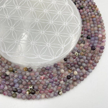 Tourmaline rose/ Rubellite, perles rondes de 6 ou 8 mm, vendu en : fil de perle 38/39 cm, en bracelet de 17 à 21cm, en collier de 45 ou sautoir de 60cm. Qualité AA à AAA, les plus belles selon Gem & Zen !